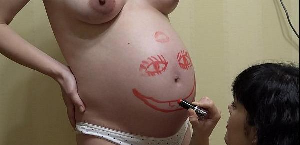  Pregnant blonde having fun with her girlfriend, lesbians love bright lipstick and kisses.